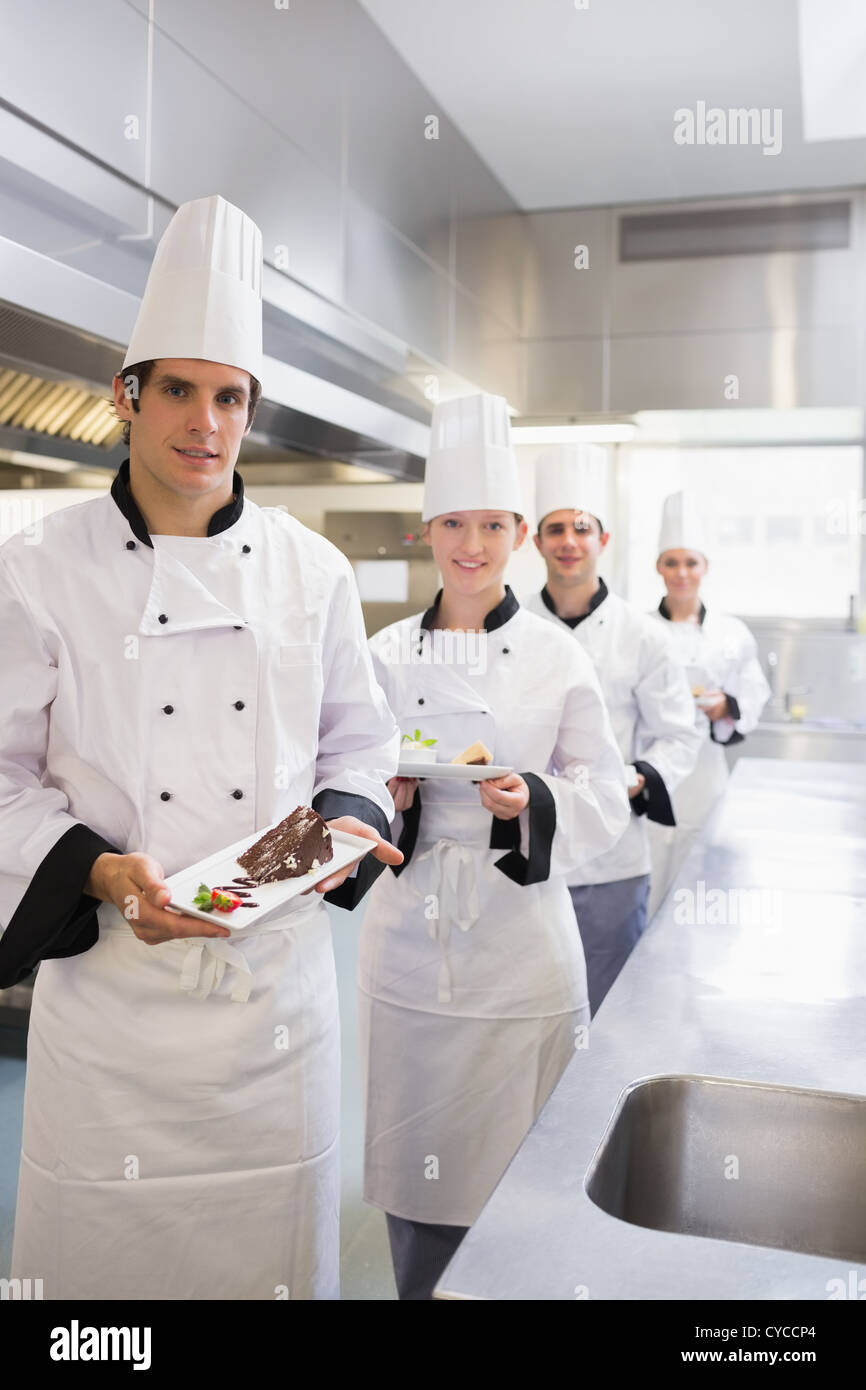 Présentation du Chef d'équipe les déserts Banque D'Images