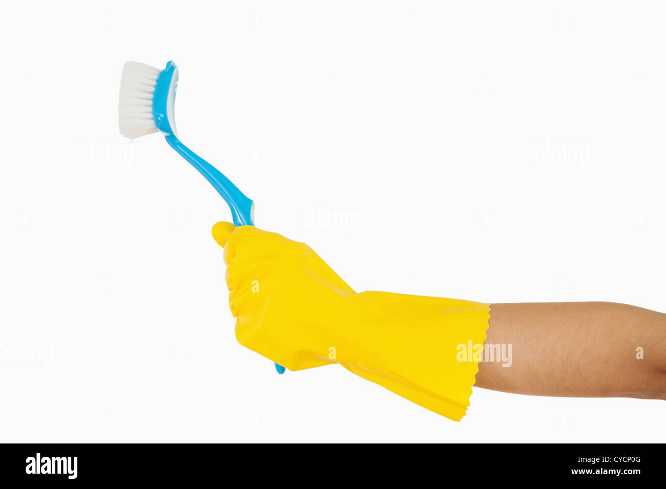 Woman's hand holding brosse à récurer Banque D'Images