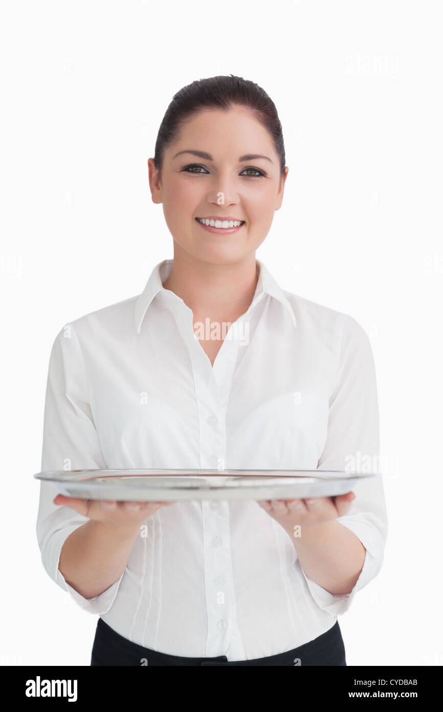 Waitress holding tray with two hands Banque D'Images