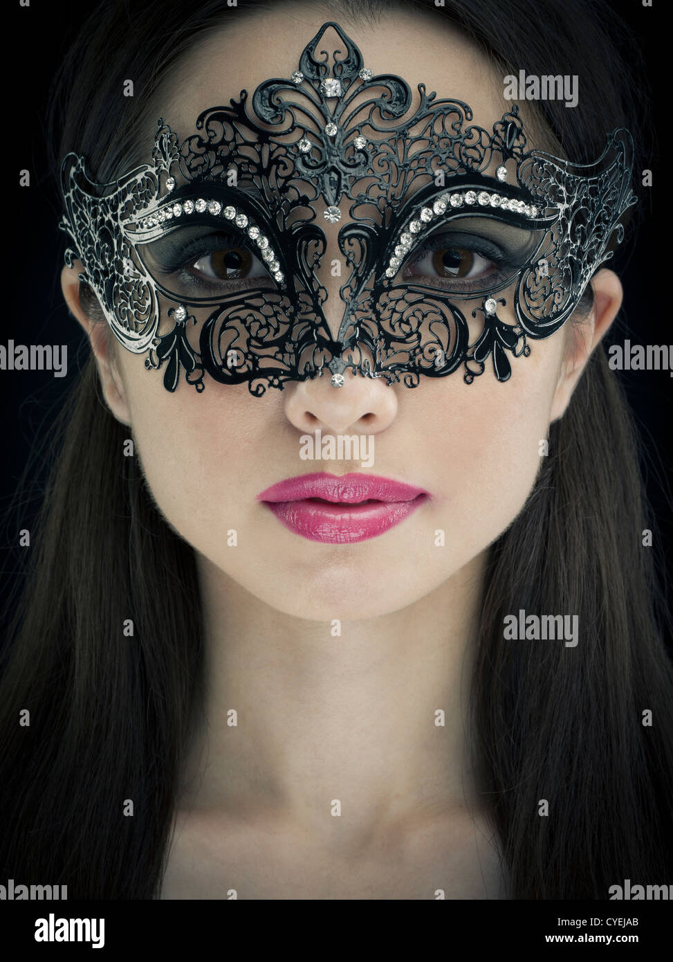 Femme portant un masque de carnaval de Venise Banque D'Images