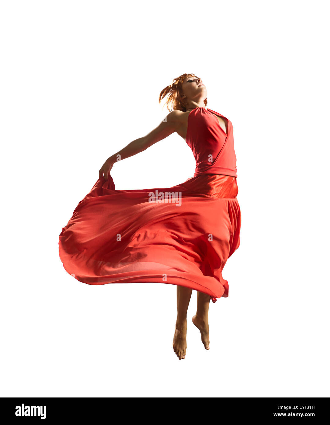 Merveilleuse jeune flying dancer wearing red dress Banque D'Images