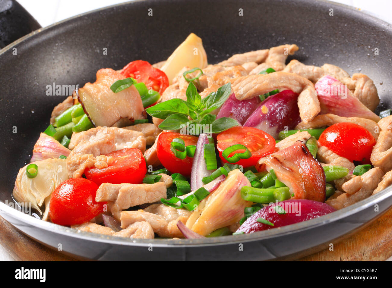 Et poulet sauté aux légumes Banque D'Images