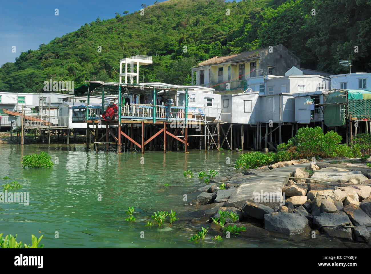 Maisons apaisa la rive de ligne Tai O village de pêcheurs sur l'île de Lantau à Hong Kong en Chine. Banque D'Images