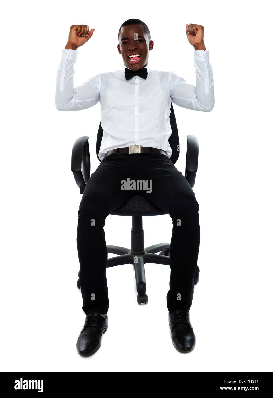 Entreprise à succès heureux homme assis sur une chaise Banque D'Images