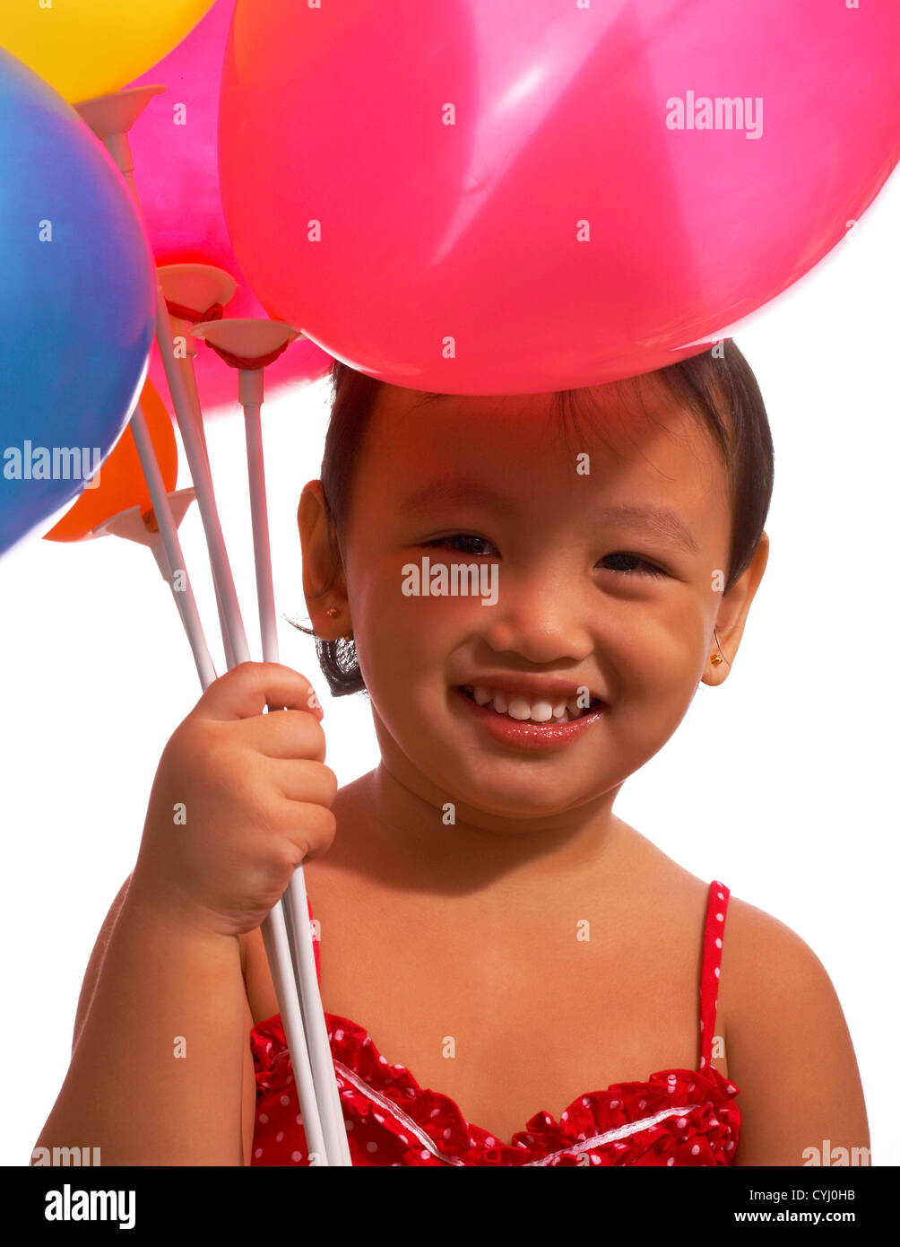 Petit enfant avec des ballons de rire et s'amuser Banque D'Images