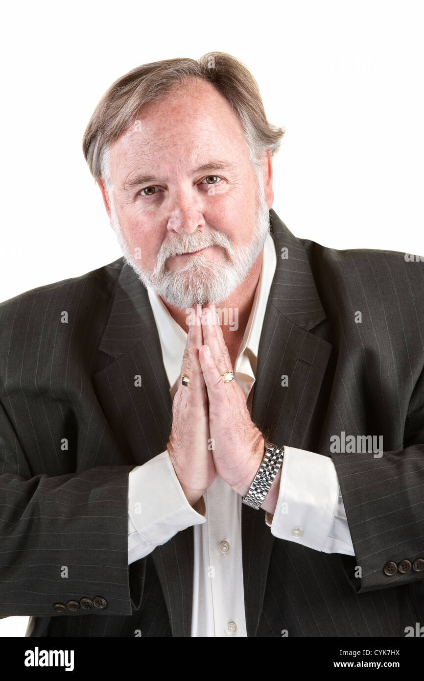 Caucasian man gesturing avec ses mains pour faire la prière Banque D'Images