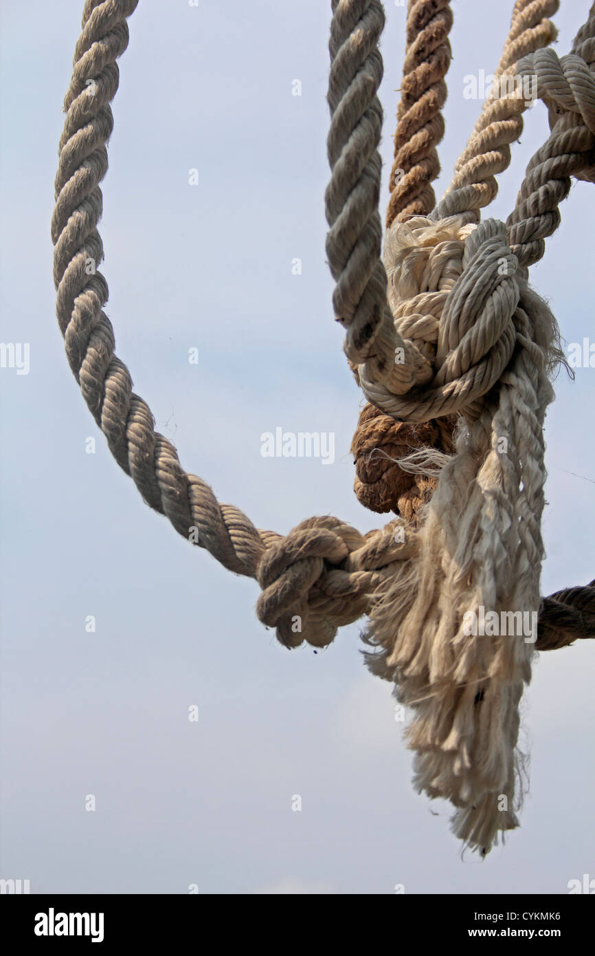 Close-up d'une corde dans un noeud Close up corde noeud résumé, fond, voile Banque D'Images