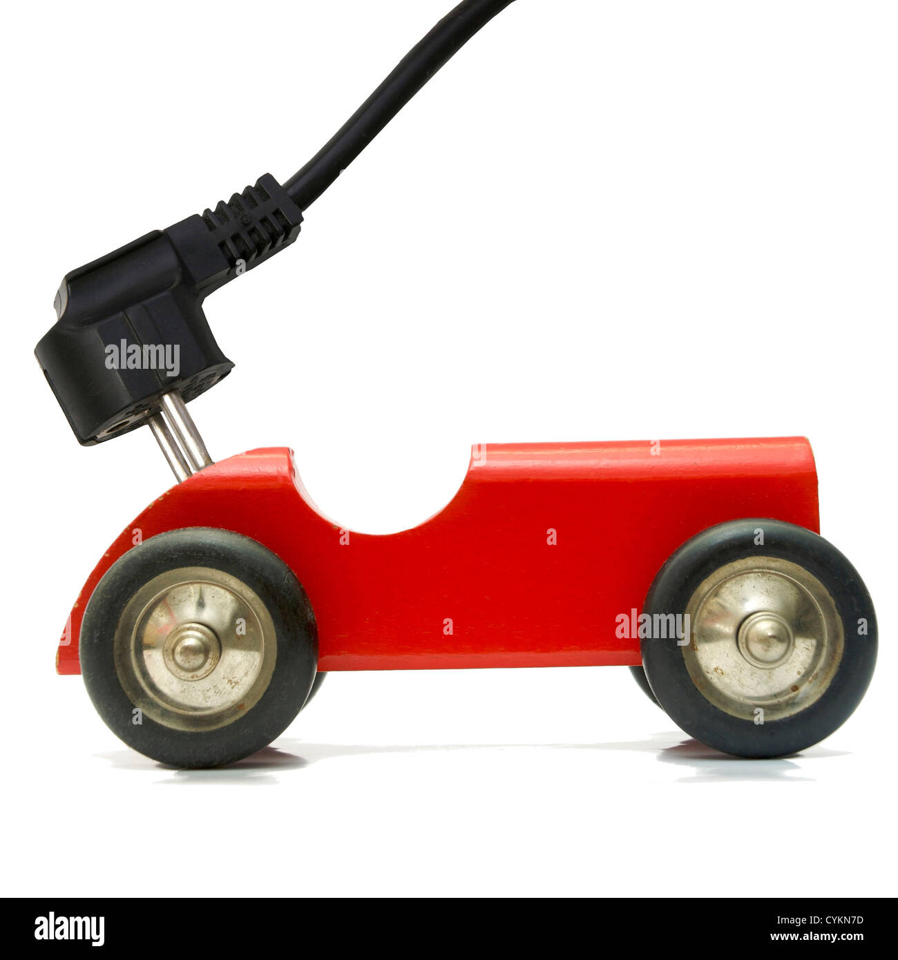 Petit jouet véhicule branché et la tarification de l'électricité à l'aide de concept plug Banque D'Images