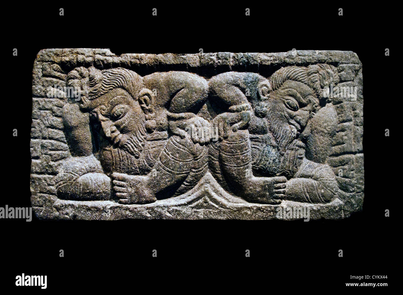 Deux Crouching Ganas 8e siècle népalais Népal Deo Patan Stone 52 cm Banque D'Images