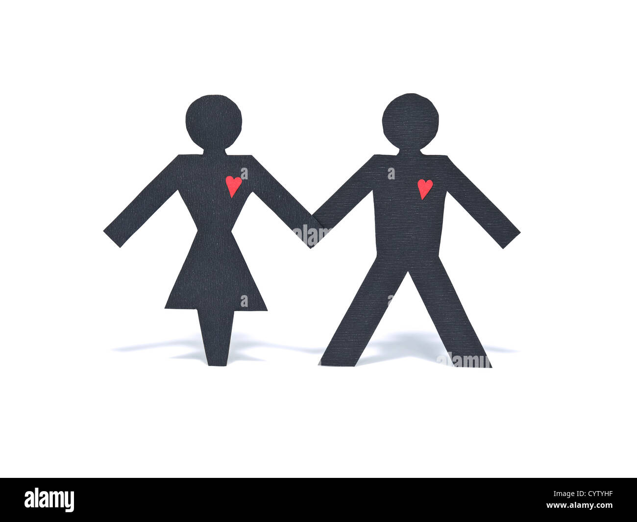 Un papier hétérosexuelle figure couple holding hands isolé sur fond blanc. Banque D'Images
