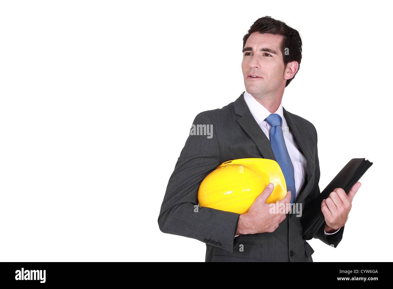 Homme en costume et un casque avec folder Banque D'Images