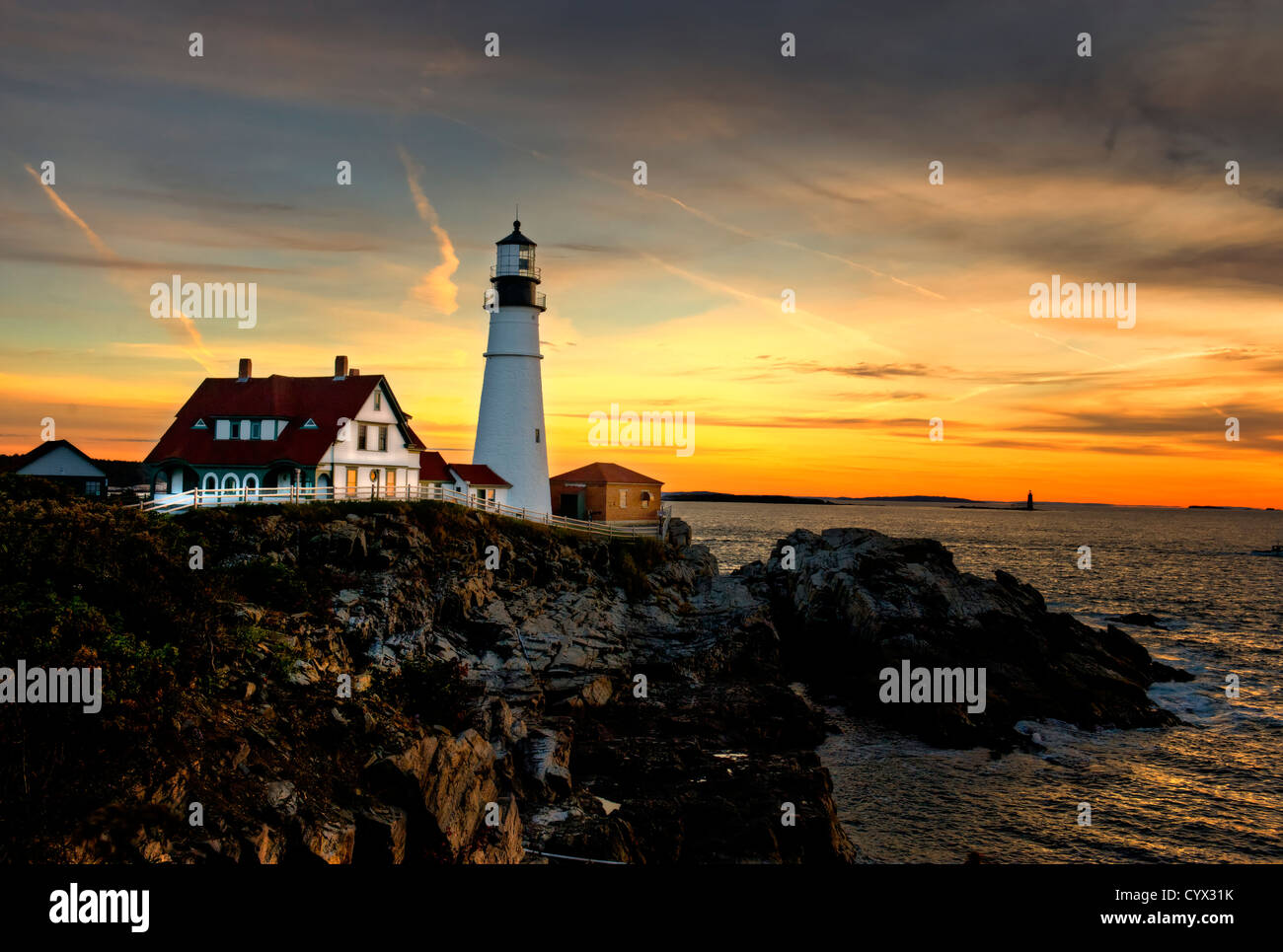 Lever du soleil sur le phare de Portland, Portland, Maine, USA. Banque D'Images