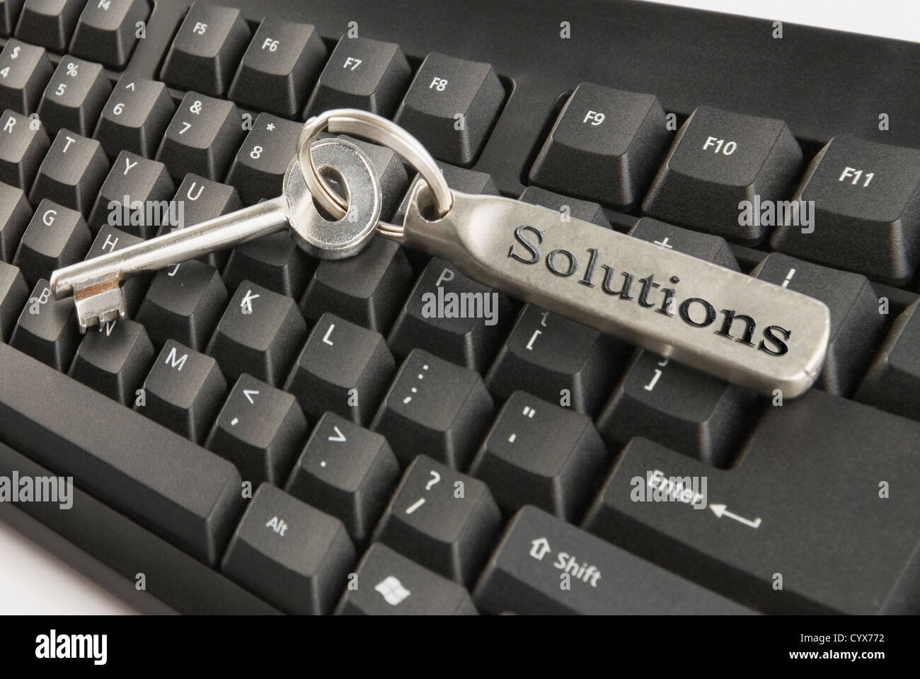 Clé de la maison sur un clavier d'ordinateur Banque D'Images