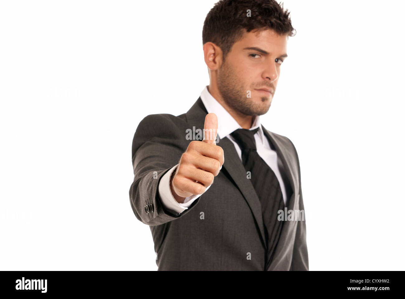 Young businessman symbole ok geste, isolé sur fond blanc. L'accent sur la main Banque D'Images