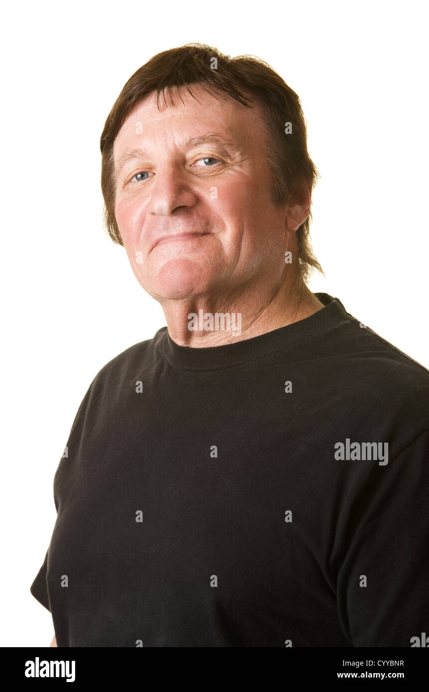 Confiant mature woman smiles sur fond blanc Banque D'Images