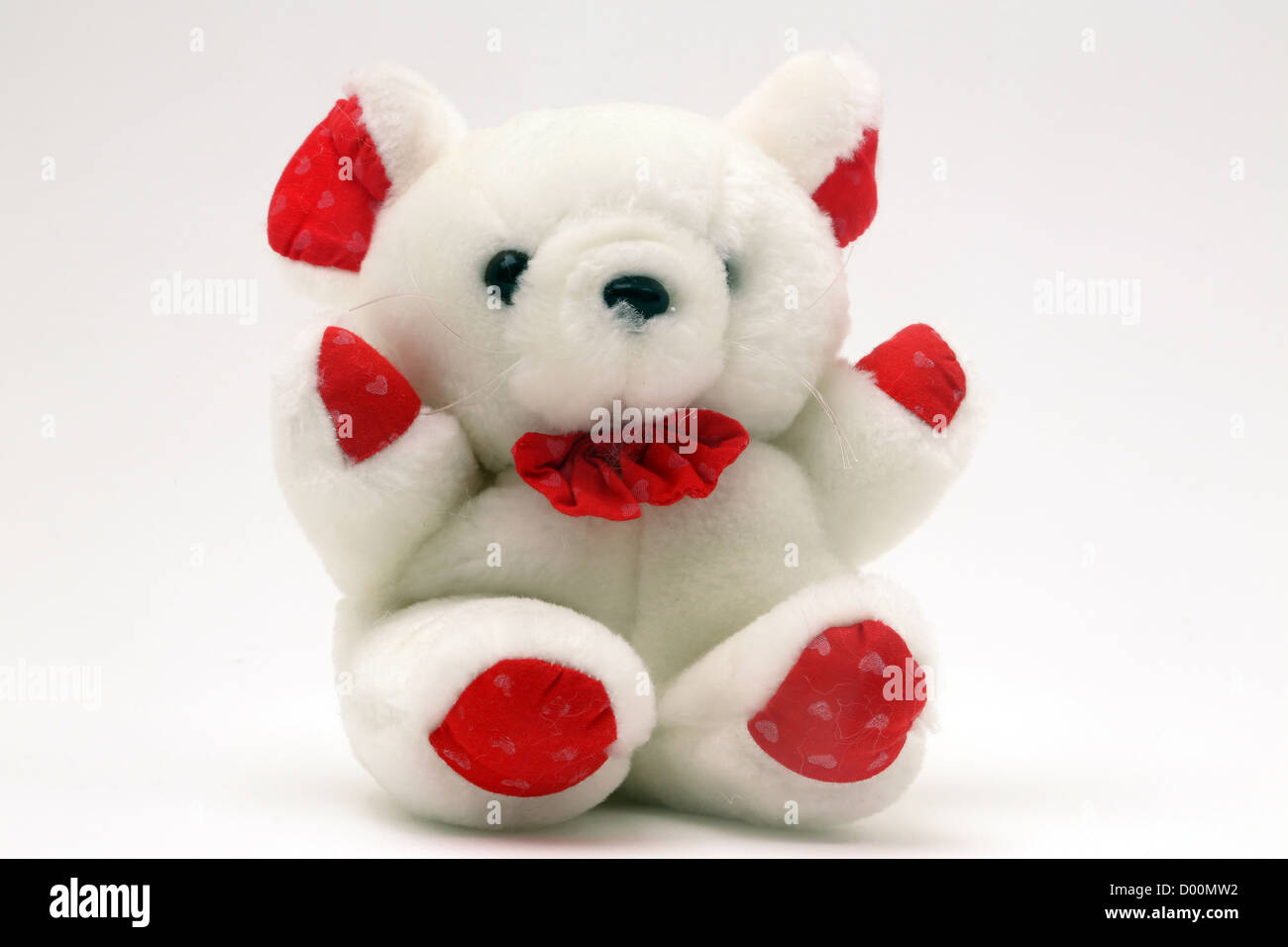 Ours blanc et rouge avec Bow Banque D'Images