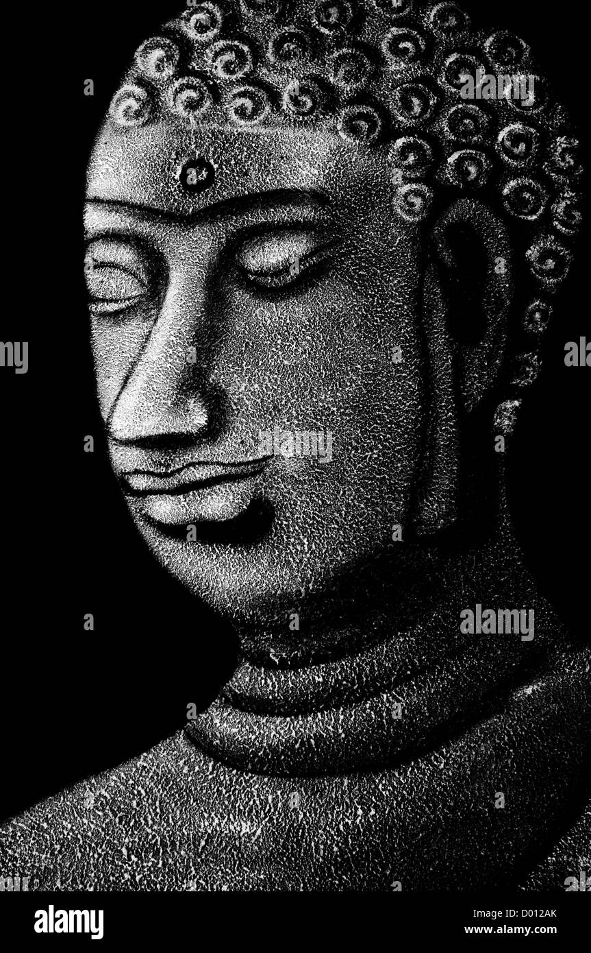 Close up stone Bouddha zen en noir et blanc. Banque D'Images