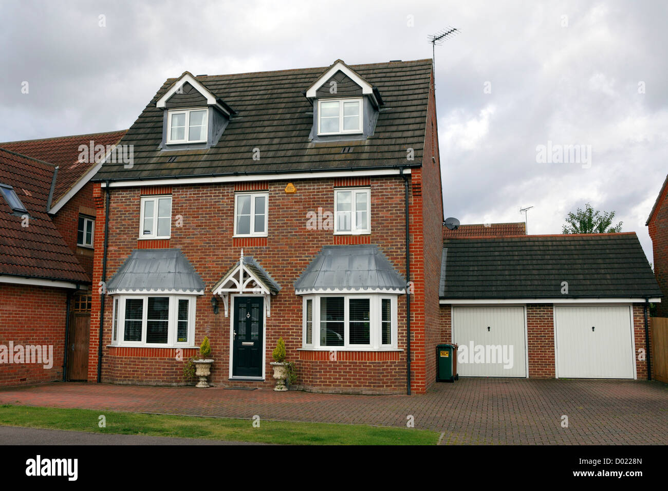 Maison individuelle moderne dans un village anglais,. Banque D'Images