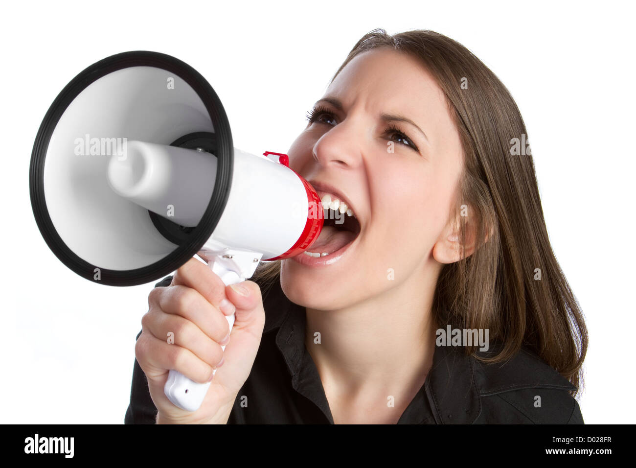 Angry woman yelling into megaphone Banque D'Images