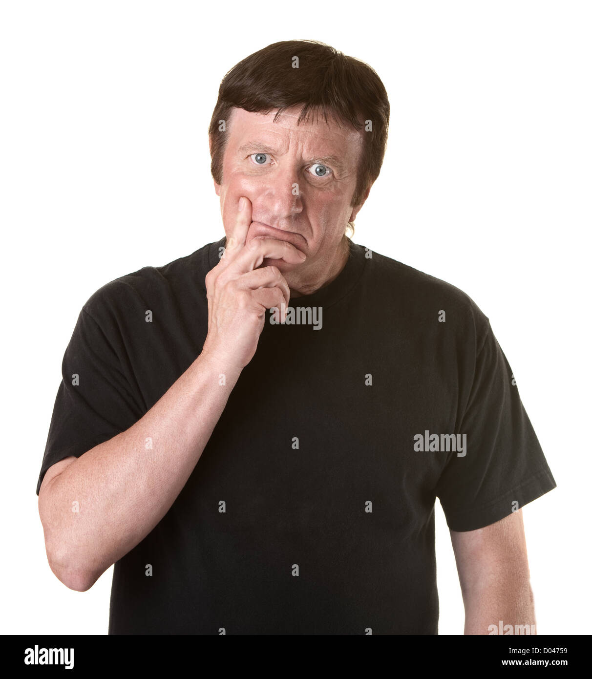 Young Caucasian man avec les doigts sur le menton sur fond blanc Banque D'Images