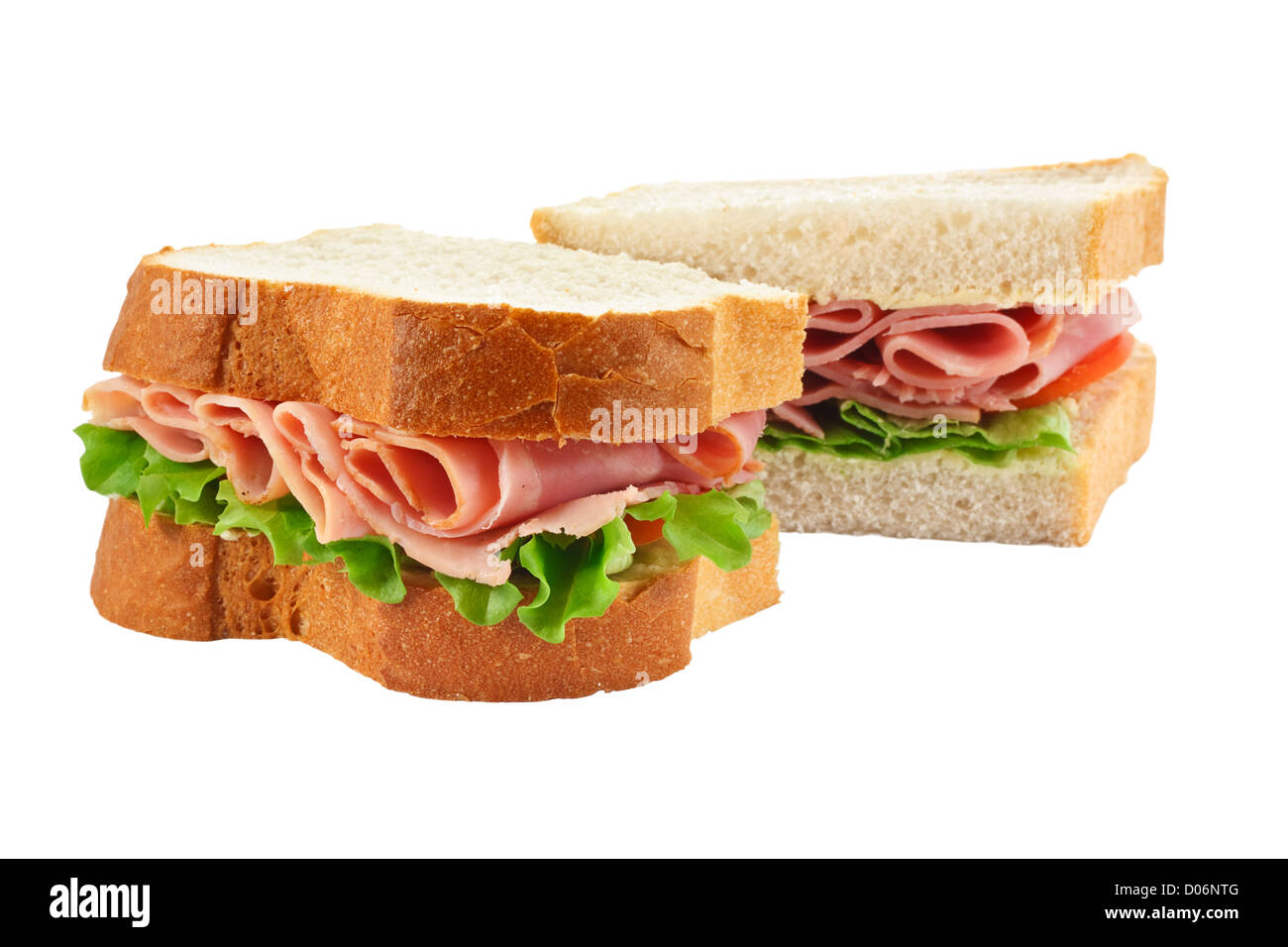 Une salade de jambon sandwich fait avec du pain en tranches coupées en deux avec l'accent sur le remplissage Banque D'Images