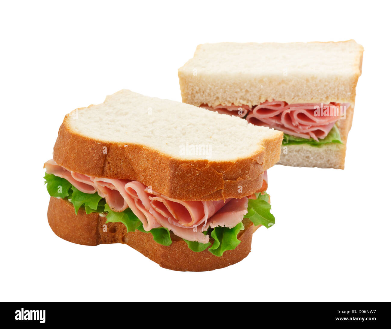 Une salade de jambon sandwich fait avec du pain en tranches coupées en deux avec l'accent sur le remplissage Banque D'Images