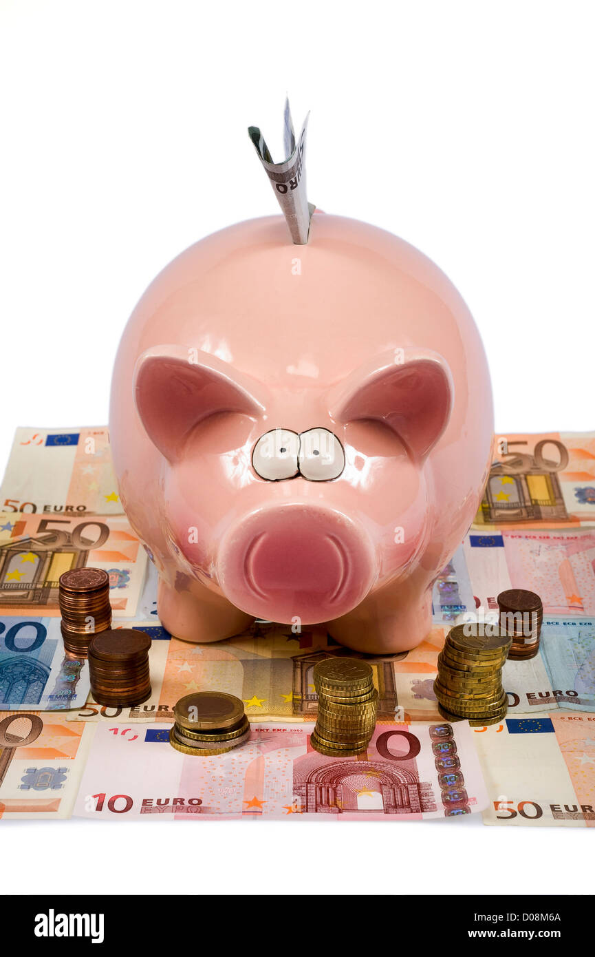Un enregistrement de porc est debout sur le papier-monnaie euro Banque D'Images