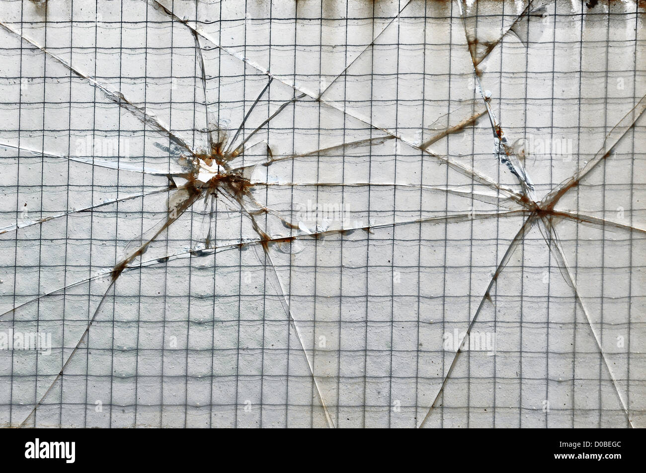 Renforcé de verre brisé avec fil carrés de fond texture. Banque D'Images