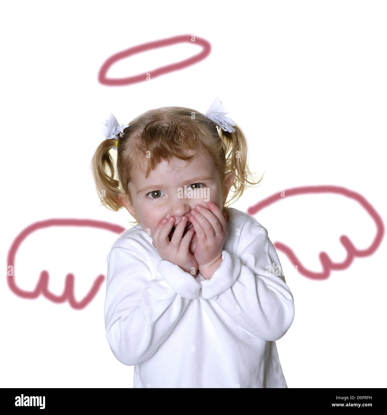 Petite fille angel avec drôle d'expression sur son visage Banque D'Images
