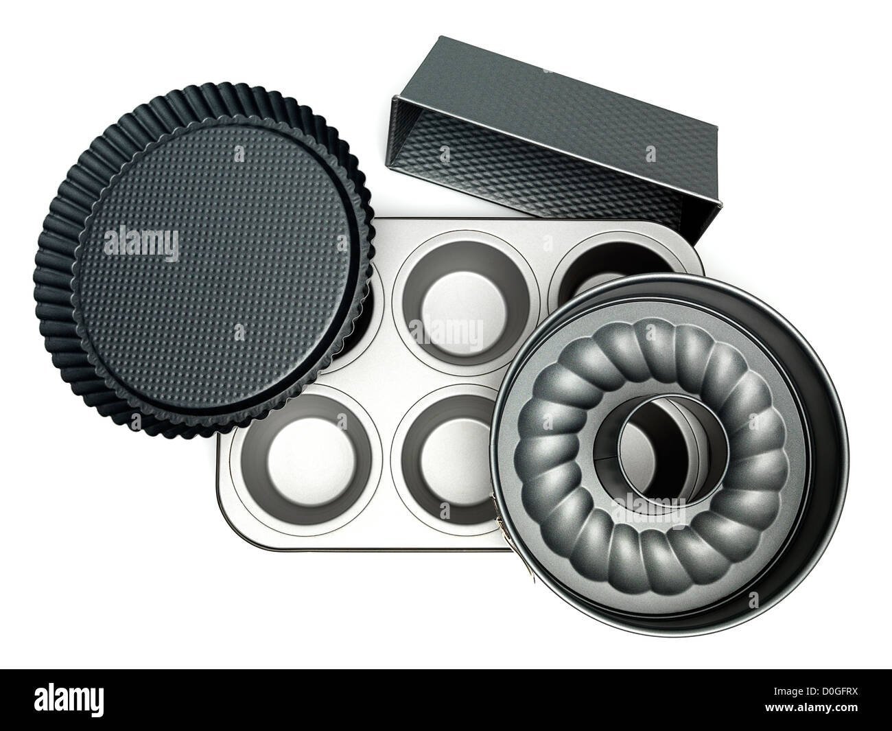 Différents moules à gâteaux sur fond blanc Banque D'Images