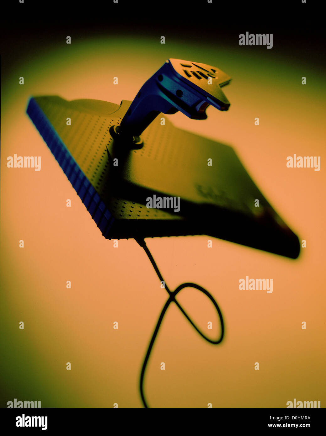 Manette de jeu d'ordinateur suspendu en Mid-Air Banque D'Images