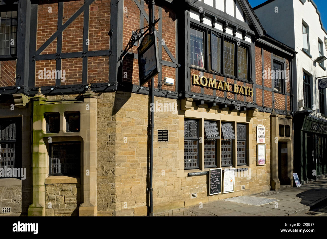 L'extérieur de la baignoire romaine pub à St Sampson's Square à New York. Banque D'Images