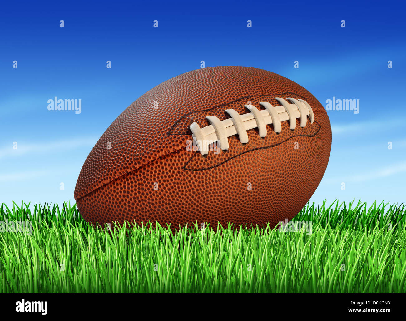 Balle de football sur une pelouse et un ciel bleu comme un professionnel ou un collège sport jeu traditionnel pour jouer américains et canadiens. Banque D'Images