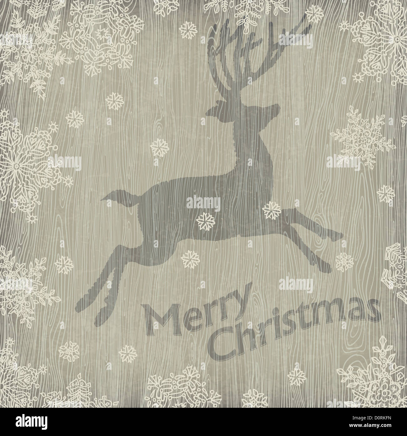 Le cerf de Noël avec des flocons de neige sur la texture en bois. Banque D'Images