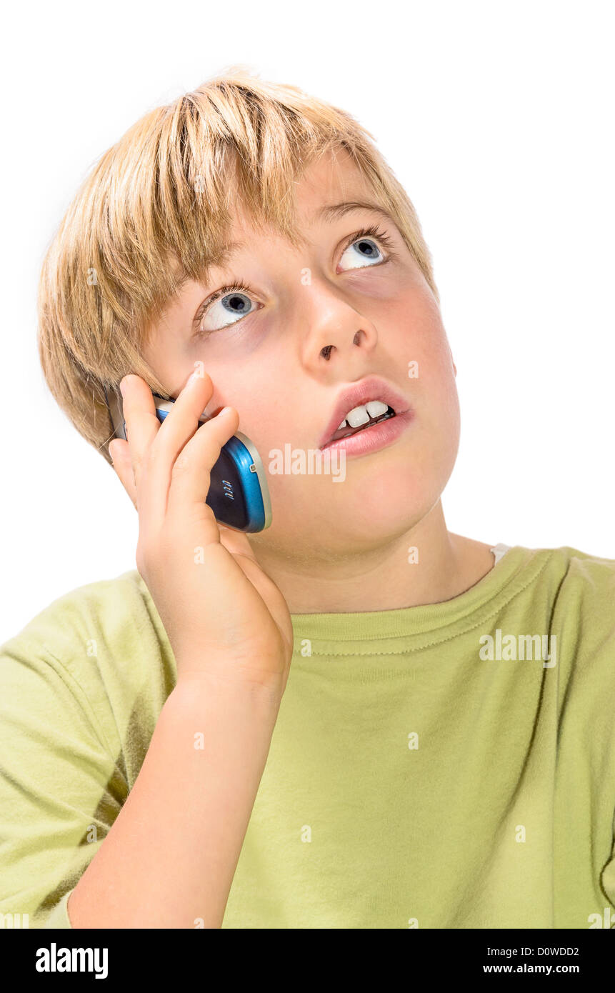 Blonde boy talking on cell phone - isolated on white Banque D'Images