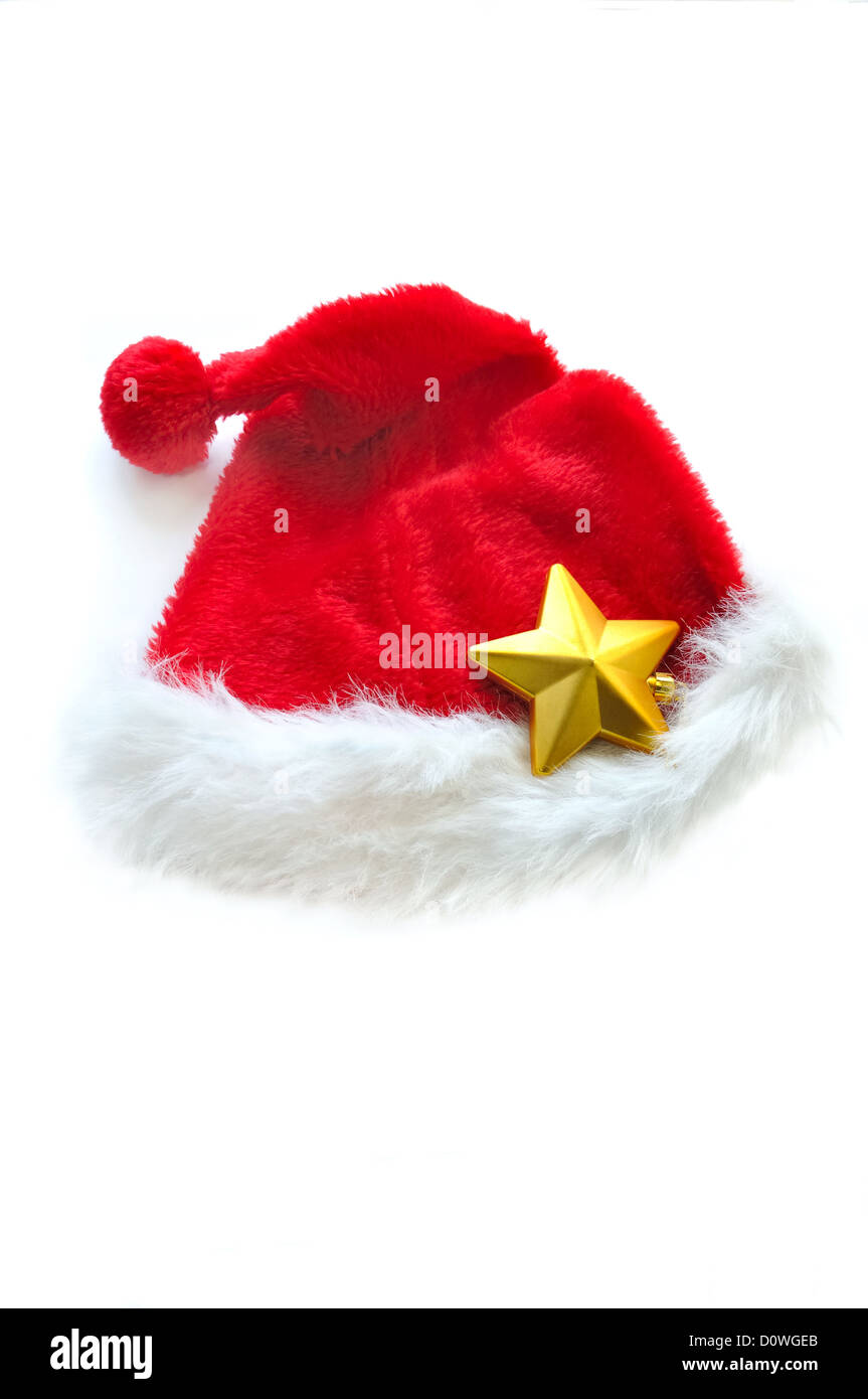 Santa hat et golden star isolé sur fond blanc Banque D'Images