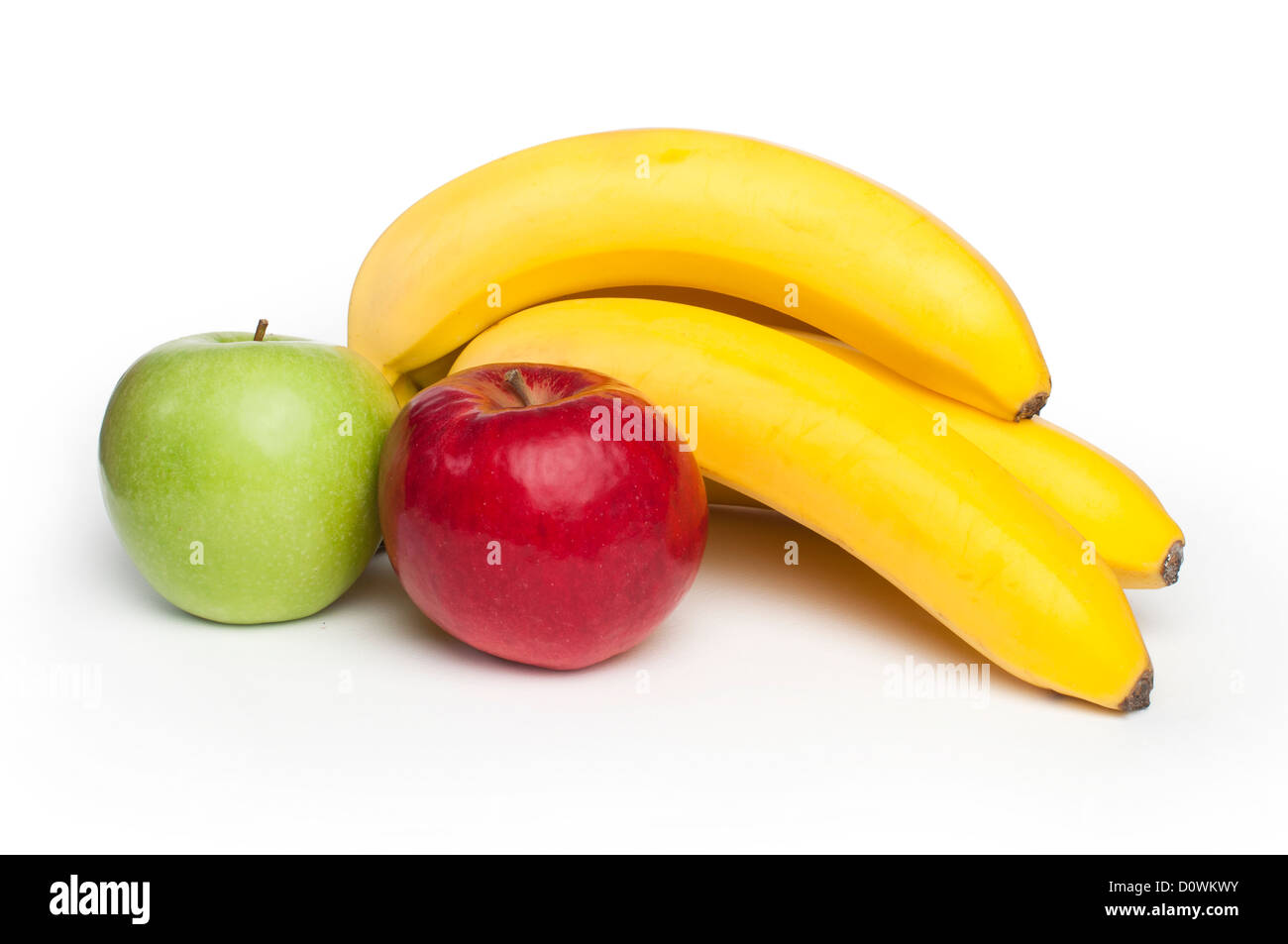 Le rouge et le vert pomme et banane isolé blanc Banque D'Images