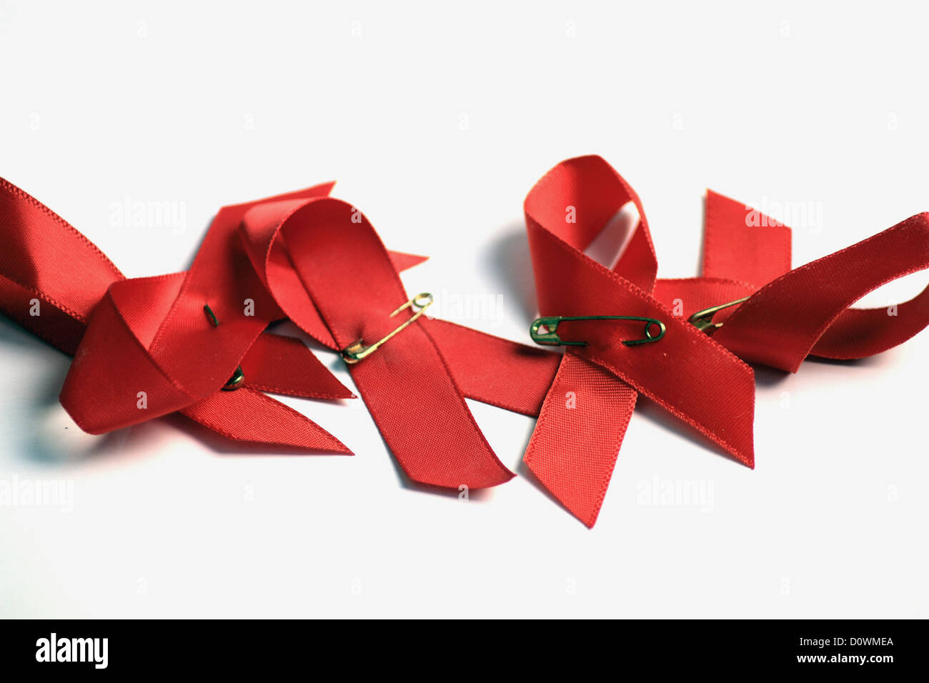 Rubans rouges contre le VIH/SIDA Banque D'Images