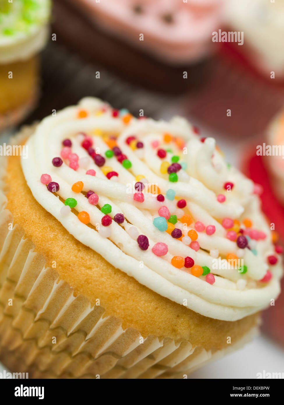 Détail macro avec muffin sprinkles colorés Banque D'Images