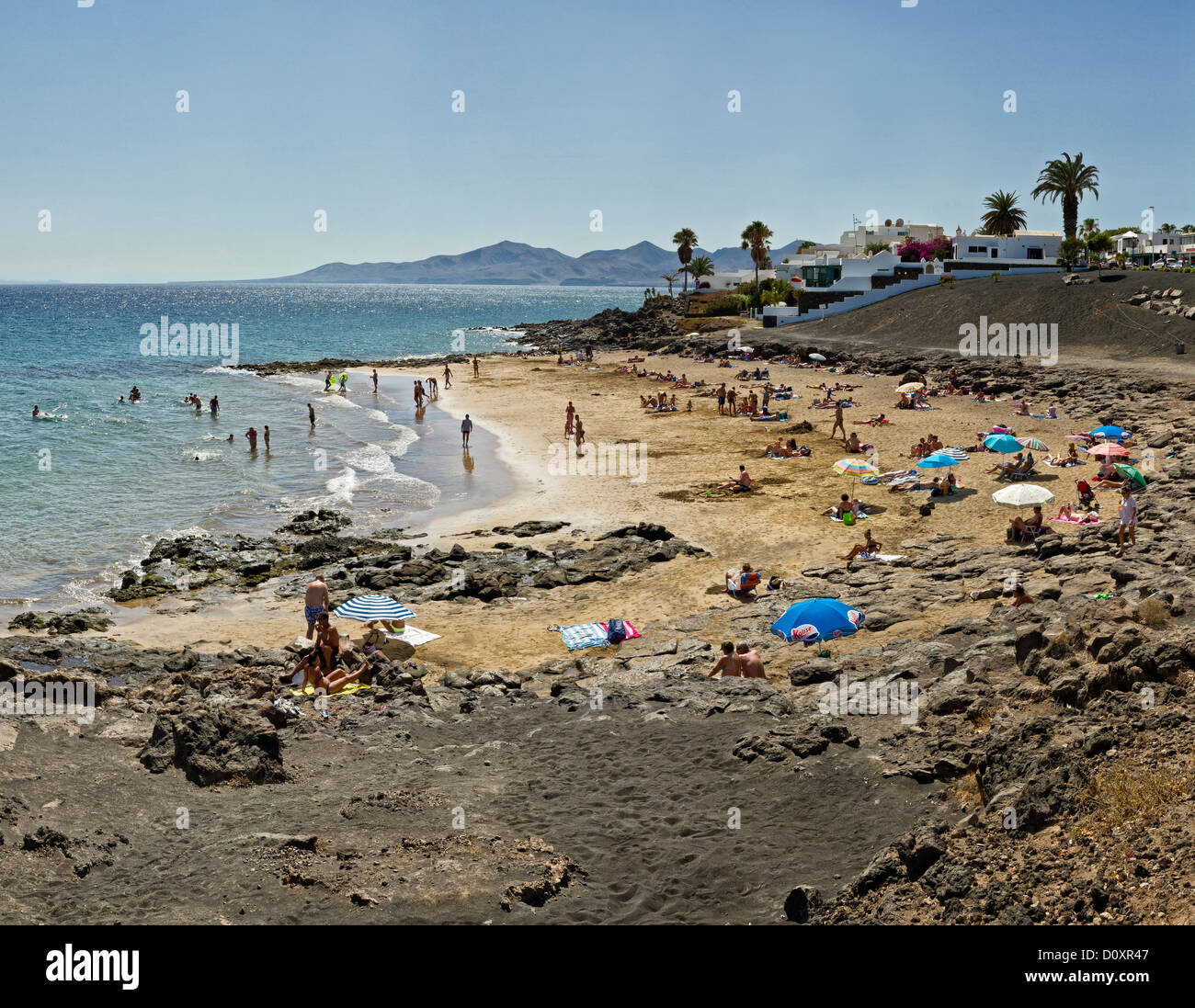 L'Espagne, Lanzarote, Puerto del Carmen, Punto El Barranquillo, paysage, eau, été, plage, mer, personnage, Canaries, Banque D'Images