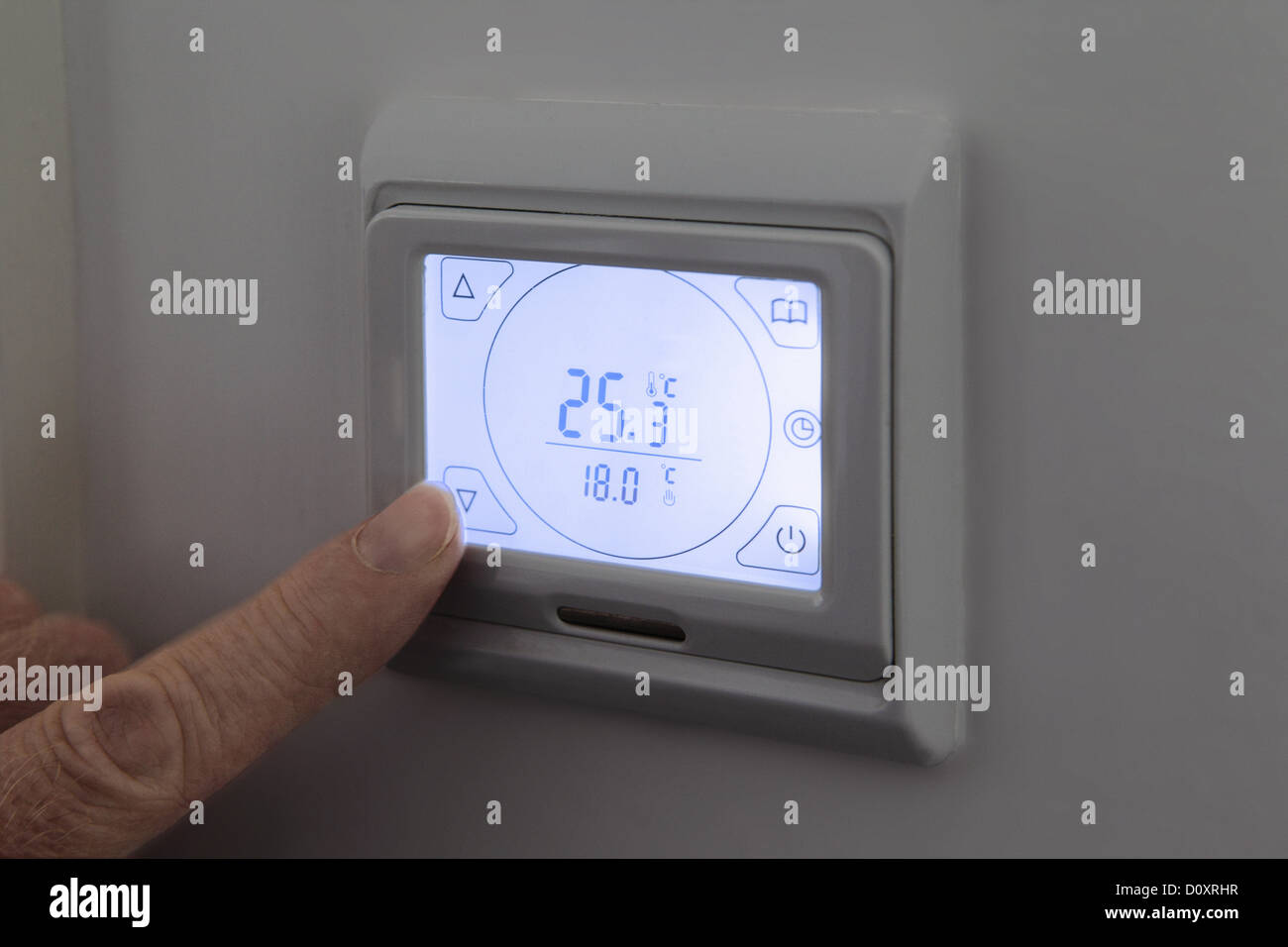 Thermostat numérique réglage de la personne Banque D'Images