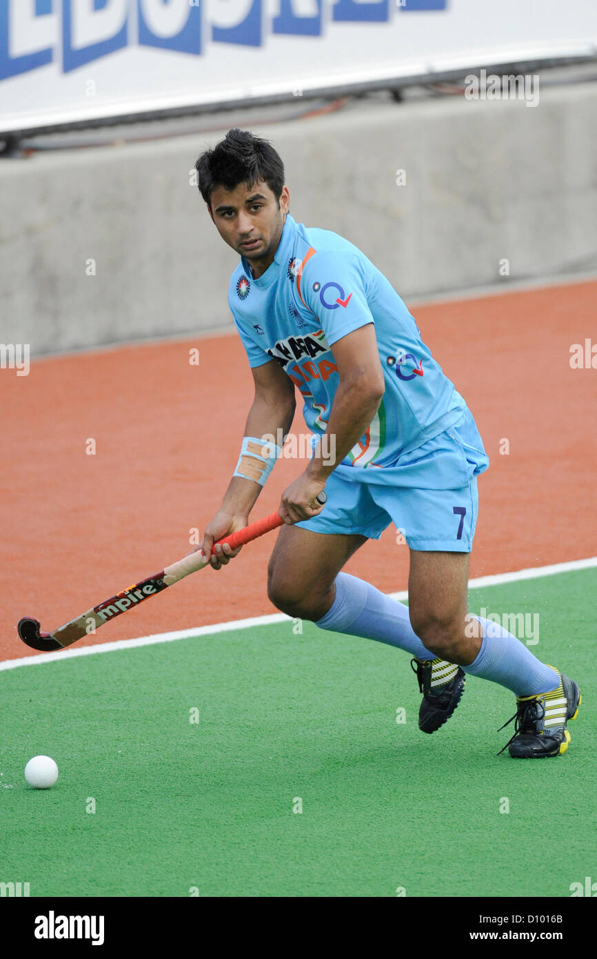 04.12.2012 Melbourne, Australie. Manpreet Singh de l'Inde tente un tir pendant la Trophée des champions de hockey masculin de l'État le netball Hockey Centre. Banque D'Images 04.12.2012 Melbourne, Australie. Manpreet Singh de l'Inde tente un tir pendant la Trophée des champions de hockey masculin de l'État le netball Hockey Centre. Banque D'Images