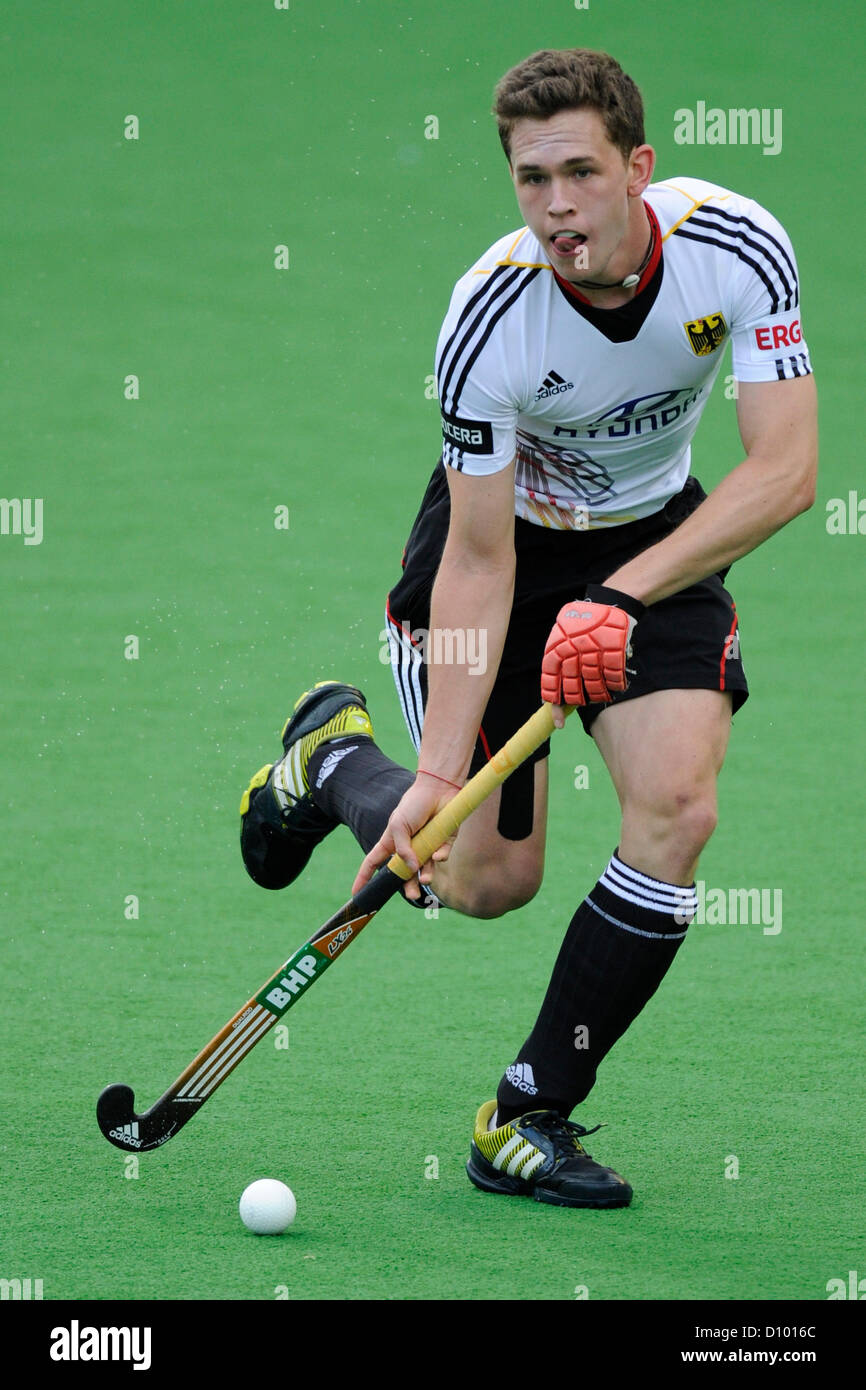 04.12.2012 Melbourne, Australie. Moritz Polk de l'Allemagne s'exécute avec le ballon lors de l'équipe masculine de hockey du Trophée des Champions de l'État Centre Hockey netball. Banque D'Images 04.12.2012 Melbourne, Australie. Moritz Polk de l'Allemagne s'exécute avec le ballon lors de l'équipe masculine de hockey du Trophée des Champions de l'État Centre Hockey netball. Banque D'Images