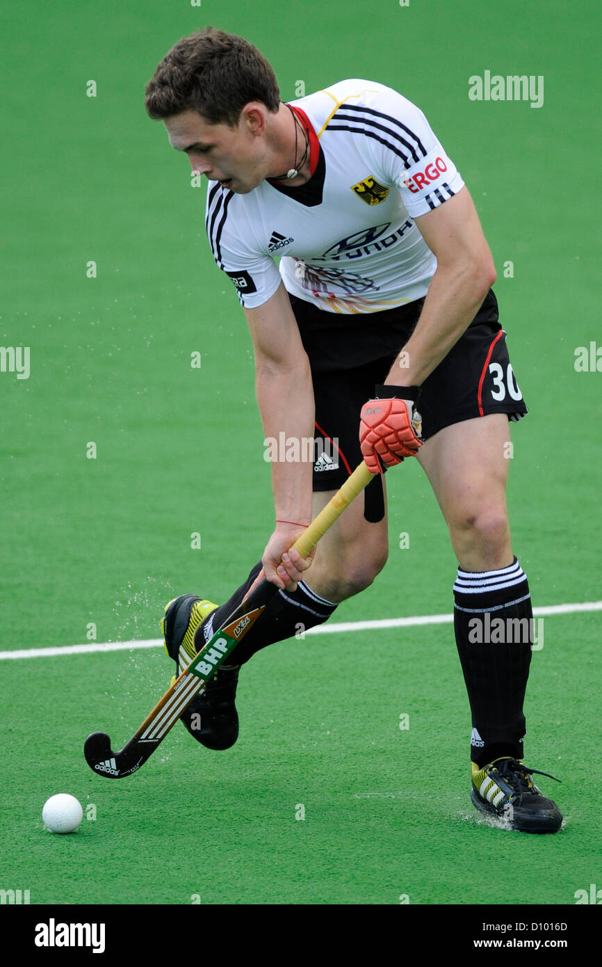 04.12.2012 Melbourne, Australie. Moritz Polk de l'Allemagne s'exécute avec le ballon lors de l'équipe masculine de hockey du Trophée des Champions de l'État Centre Hockey netball. Banque D'Images 04.12.2012 Melbourne, Australie. Moritz Polk de l'Allemagne s'exécute avec le ballon lors de l'équipe masculine de hockey du Trophée des Champions de l'État Centre Hockey netball. Banque D'Images
