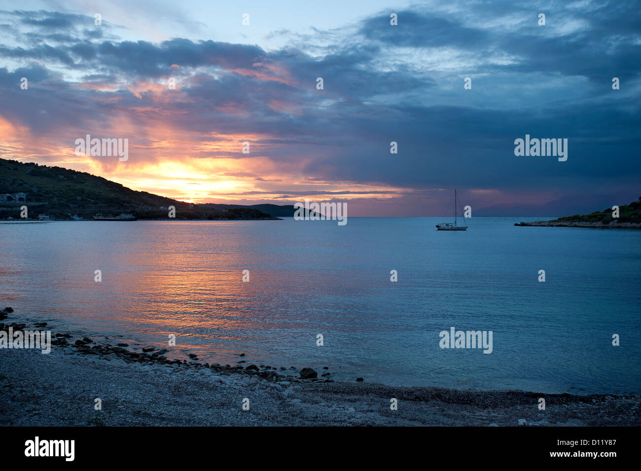 Coucher du soleil à Naxos Beach, Corfou, îles Ioniennes, Grèce Banque D'Images