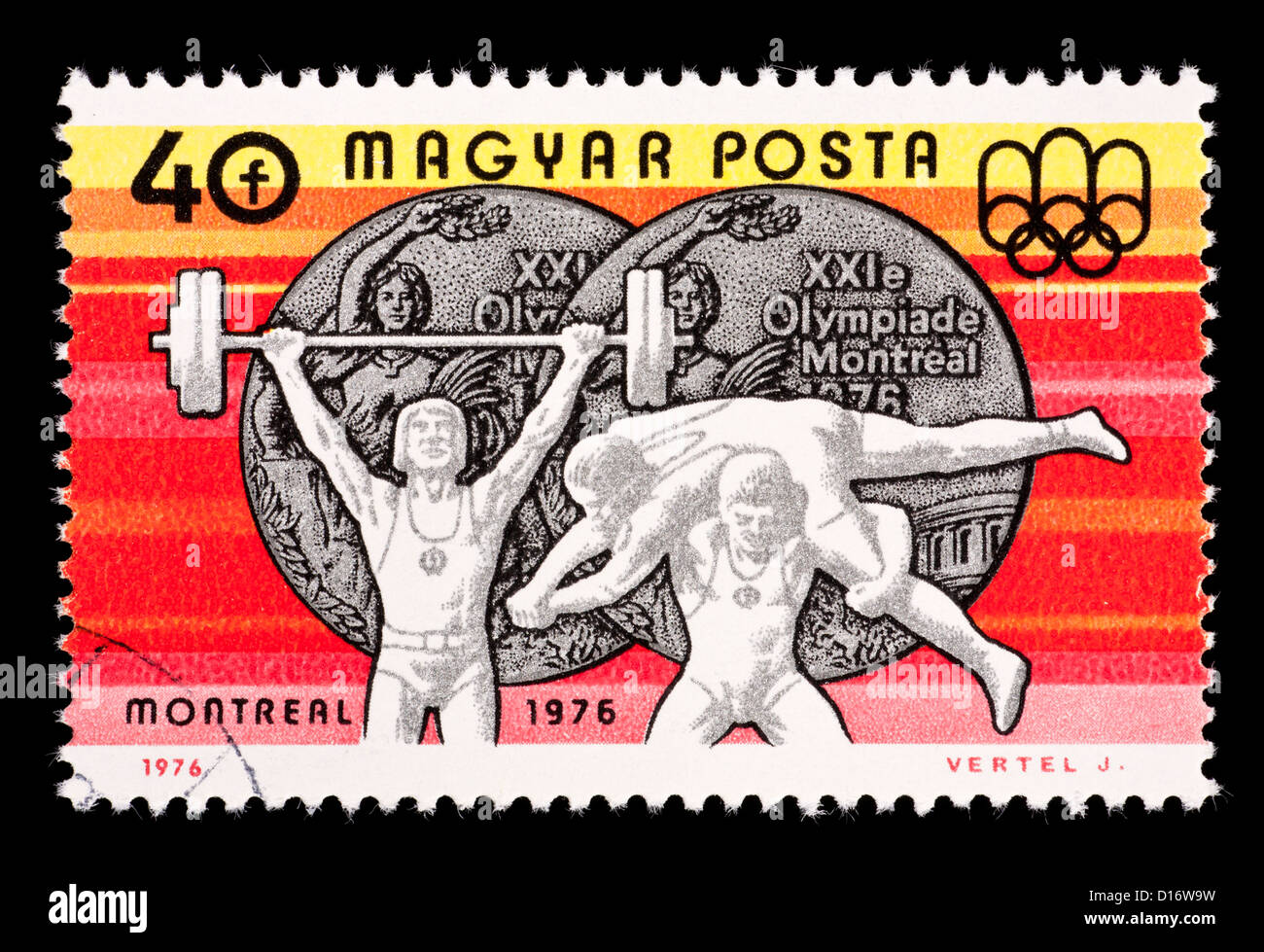 Timbre-poste de Hongrie représentant un haltérophile, lutteurs gréco-romaine et l'argent de Jeux Olympiques d'été de 1976. Banque D'Images