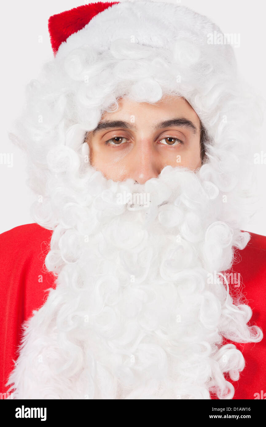 Portrait jeune homme en costume de Père Noël Banque D'Images