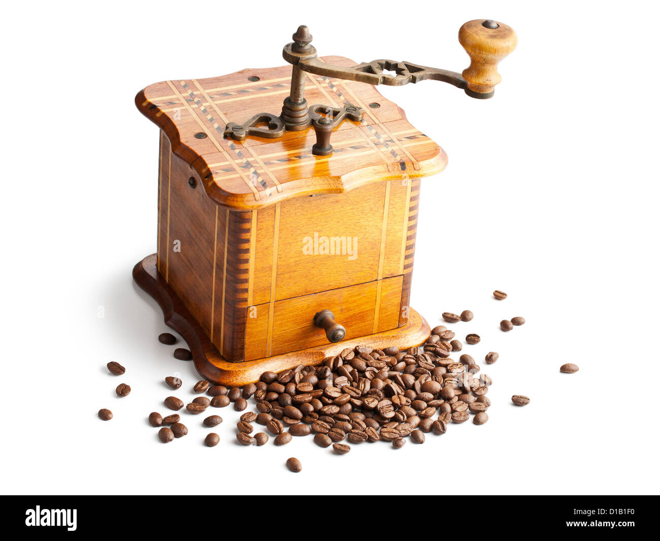Un moulin à café avec café en grains Banque D'Images
