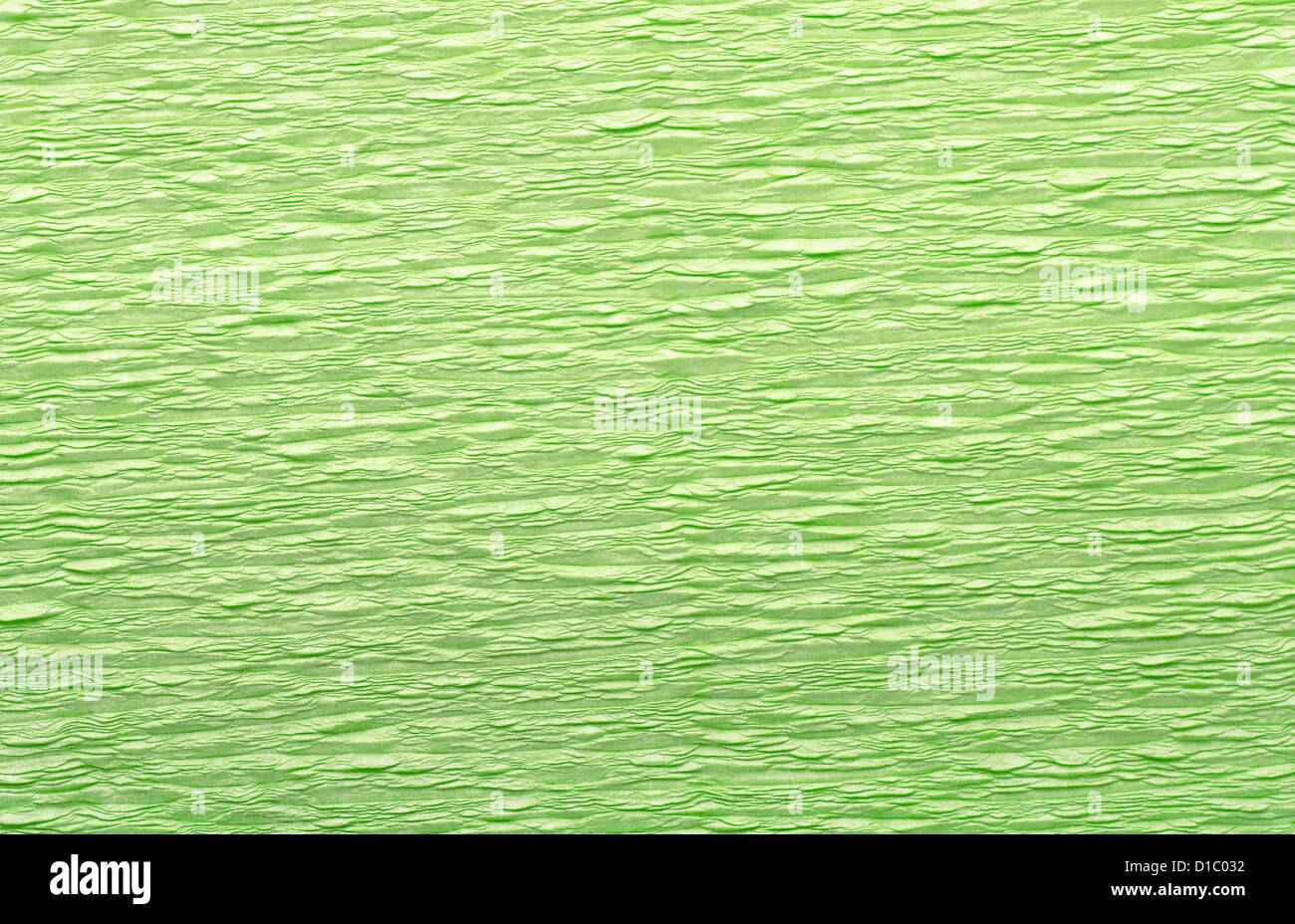 Fond papier crêpe froissé vert Banque D'Images