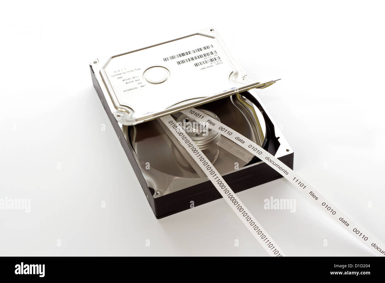 Disque dur et semi-ouverte et une bande avec le contenu du disque, Banque D'Images